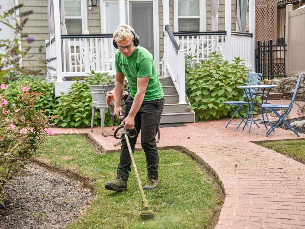 Landscaping team member preparing ground for a new garden in Dubai